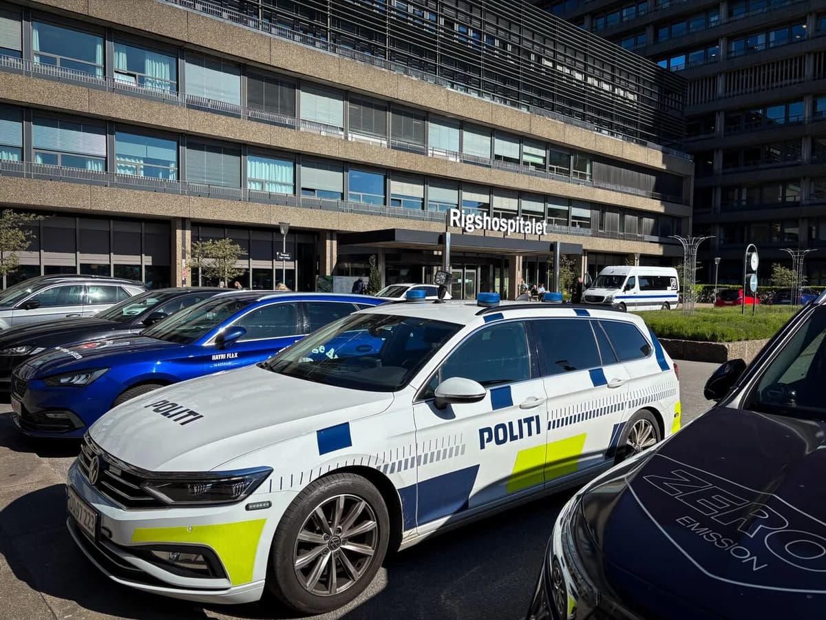 Danish police car parked in front of Rigshospitalet hospital entrance